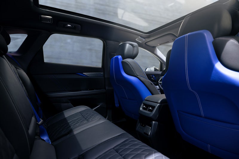 Back Seat View of the 2026 OPTIQ-V Blue Front Seats, Sun Roof, and Interior | Coleman Cadillac in LAWRENCEVILLE NJ